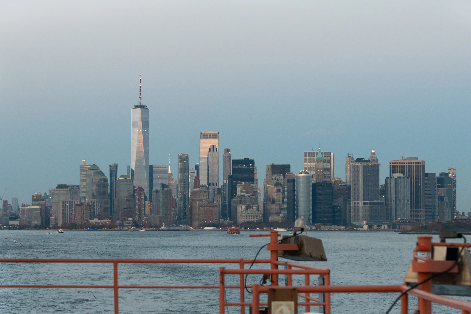 Lower Manhattan skyline seen across the water at blue hour